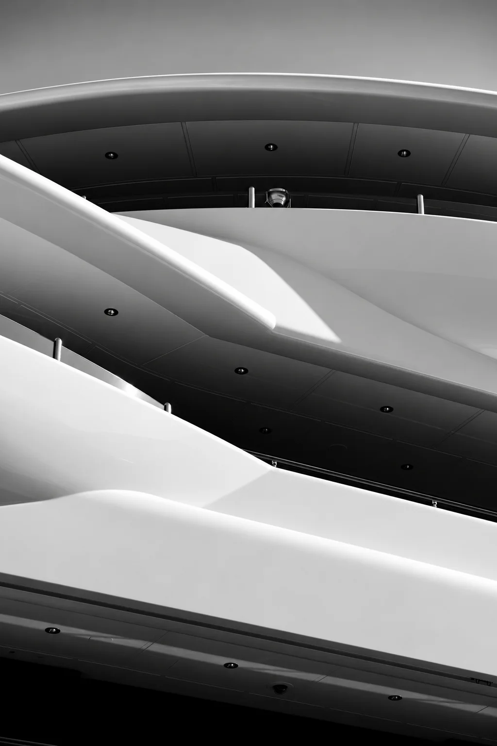 Sculptural lines across the exterior of a contemporary yacht.