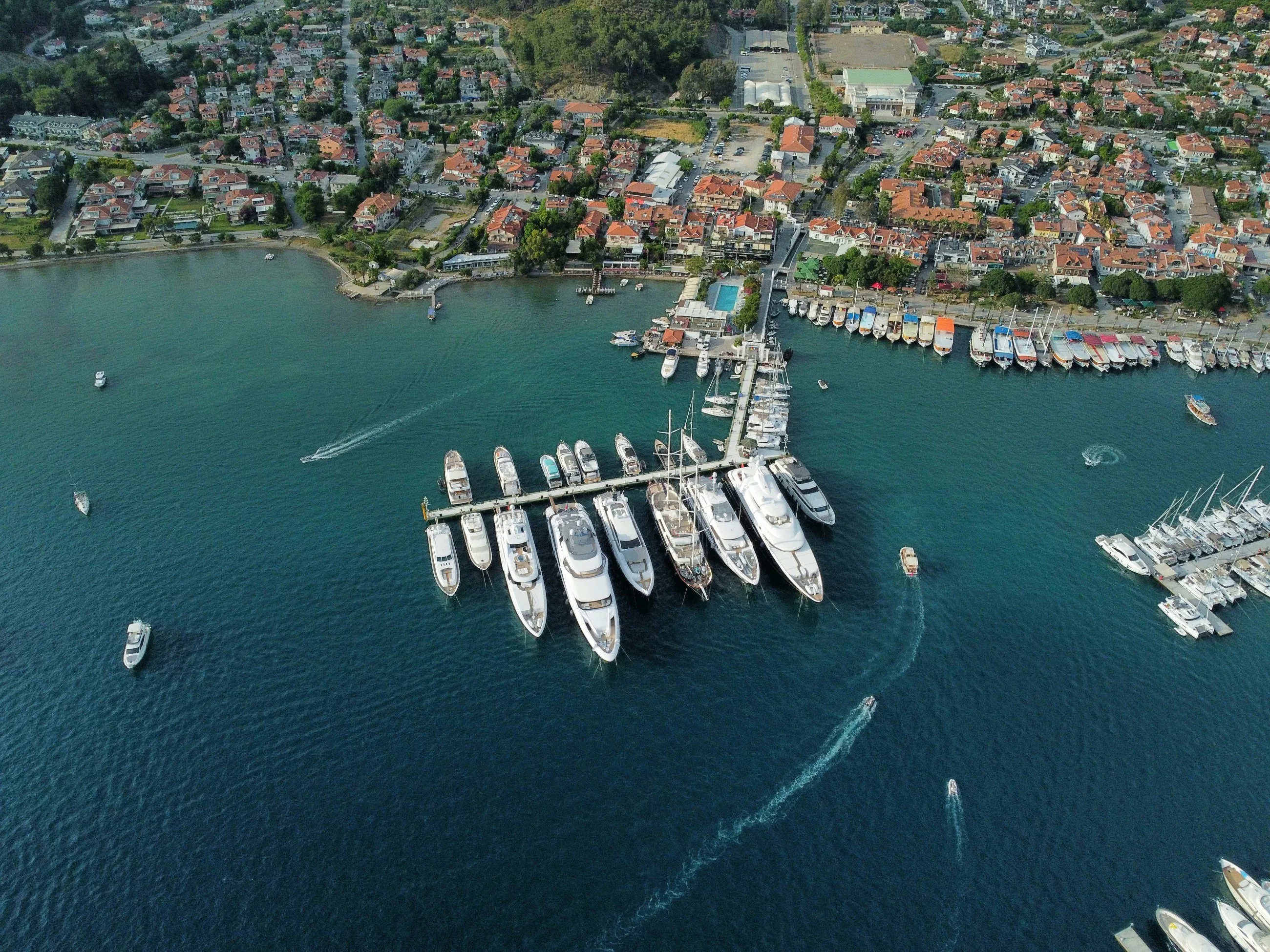 Aerial view of marina with parked superyachts