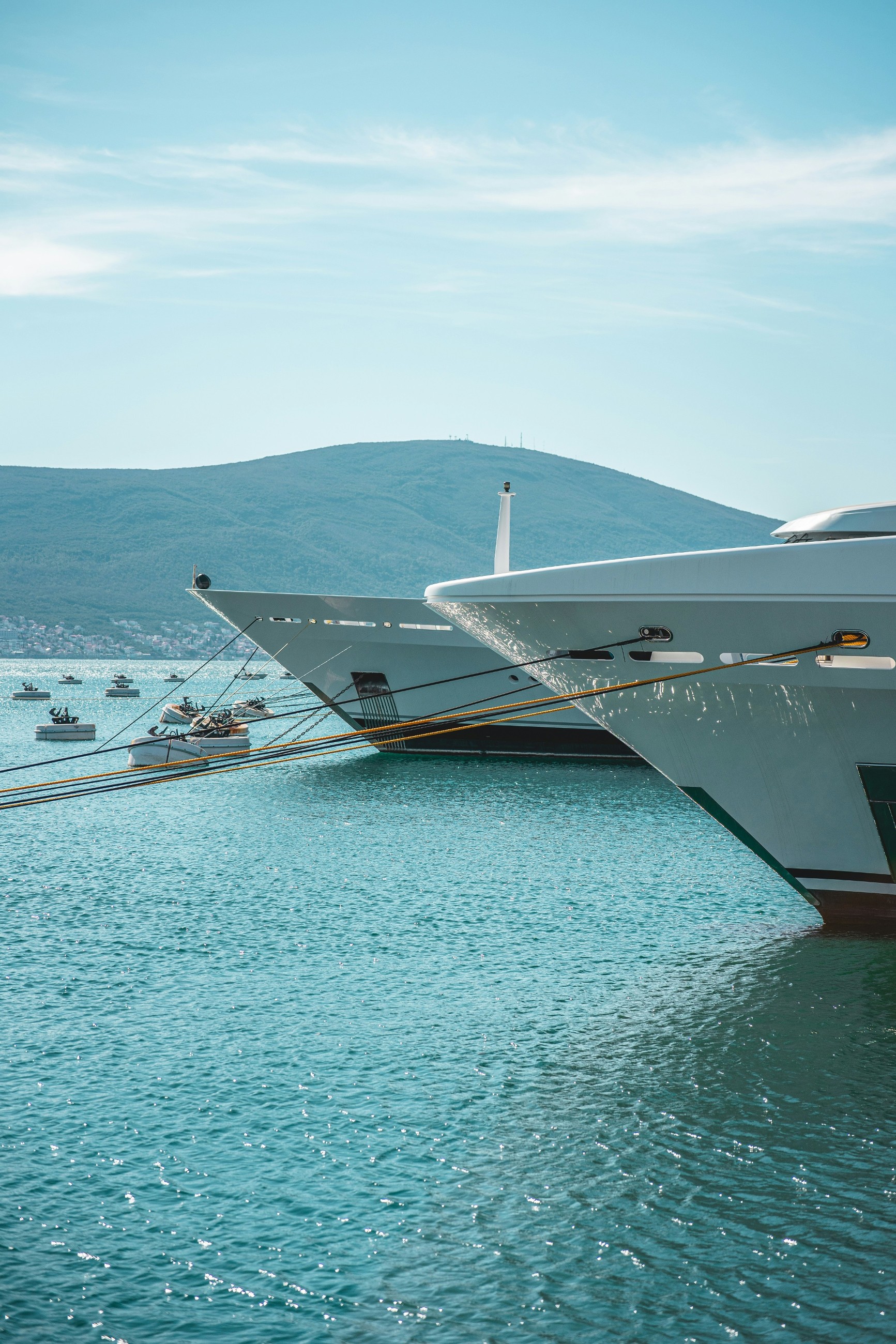 Yacht bows lined up in a Mediterranean port