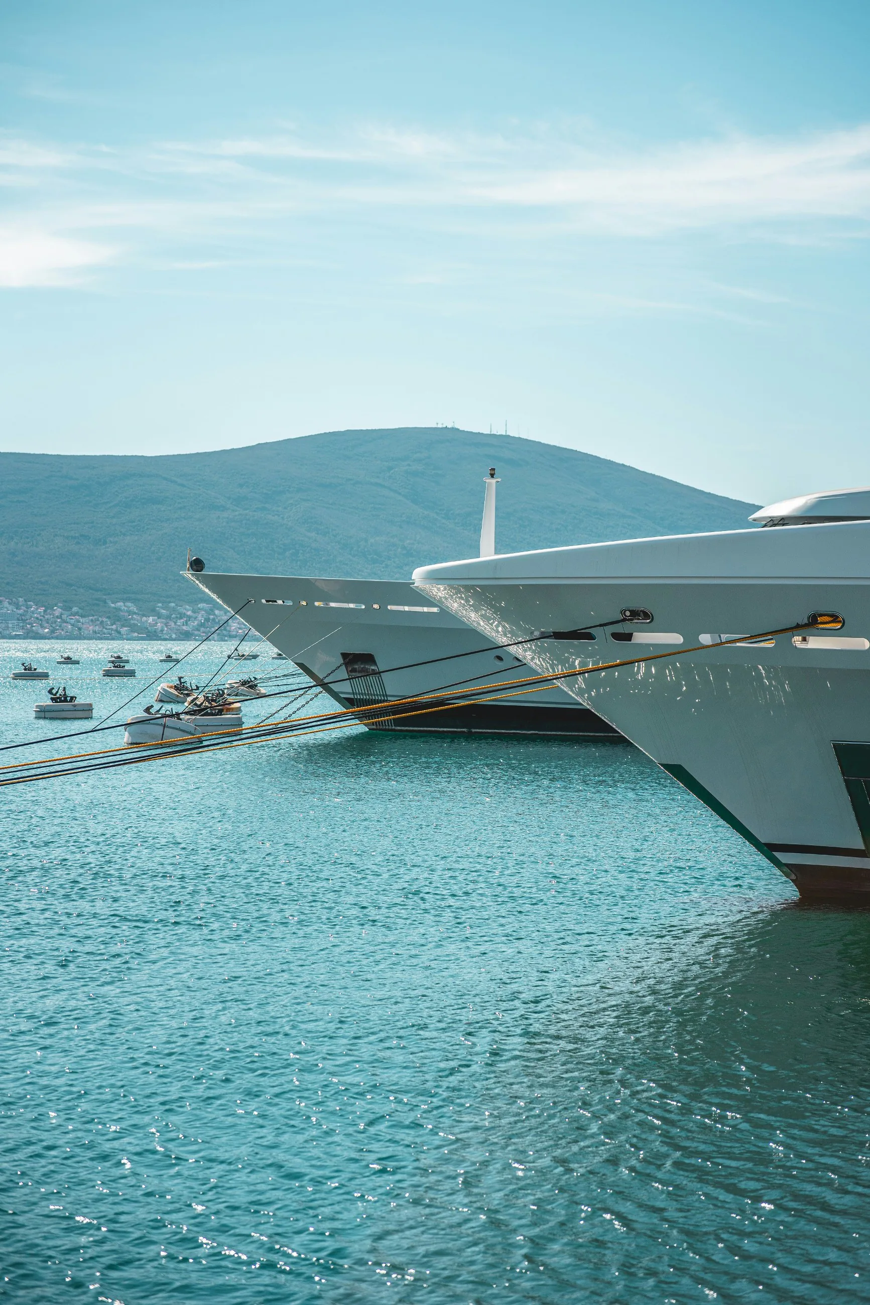 Yacht bows lined up in a Mediterranean port
